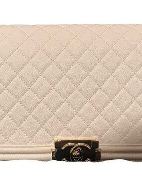 Chanel boy bag in light cream with gold hardware